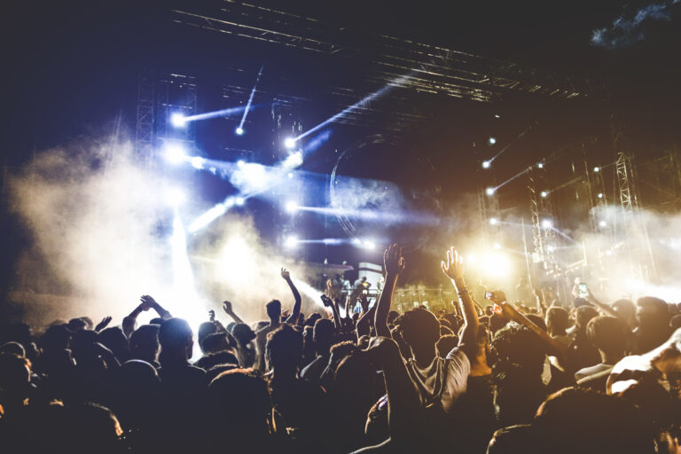 Young people dancing and having fun in summer festival party outdoor ...